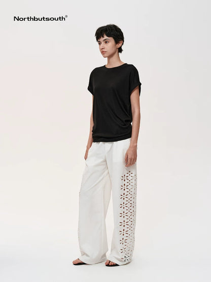 Laser-Cut Hollow-Out Straight-Leg Pants In Black And White