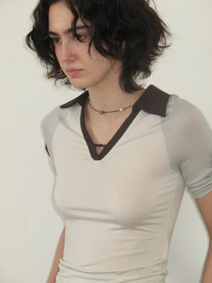 Mito de dar V-Neck Lyocell Polo With Contrast Stripes