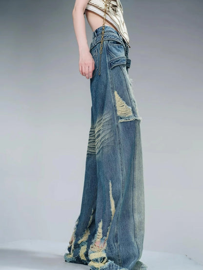 Distressed Pulled Denim Jeans With Ripped Details