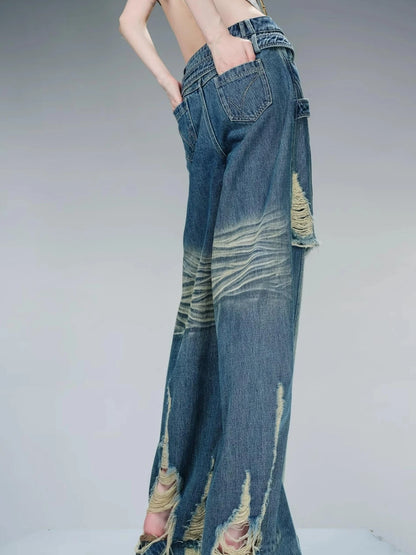Distressed Pulled Denim Jeans With Ripped Details