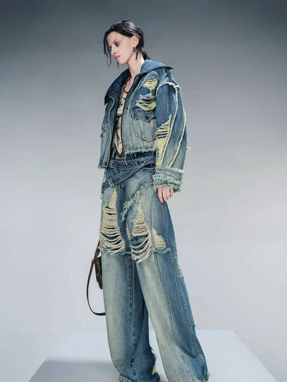 Distressed Pulled Denim Jeans With Ripped Details