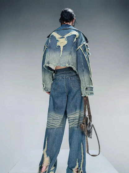 Distressed Pulled Denim Jeans With Ripped Details