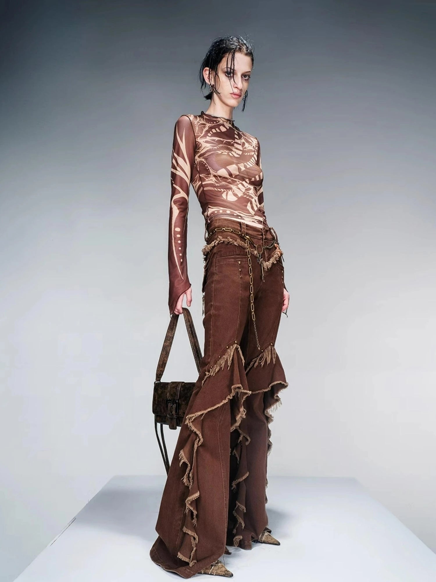 Flared Denim Pants With Asymmetrical Hem