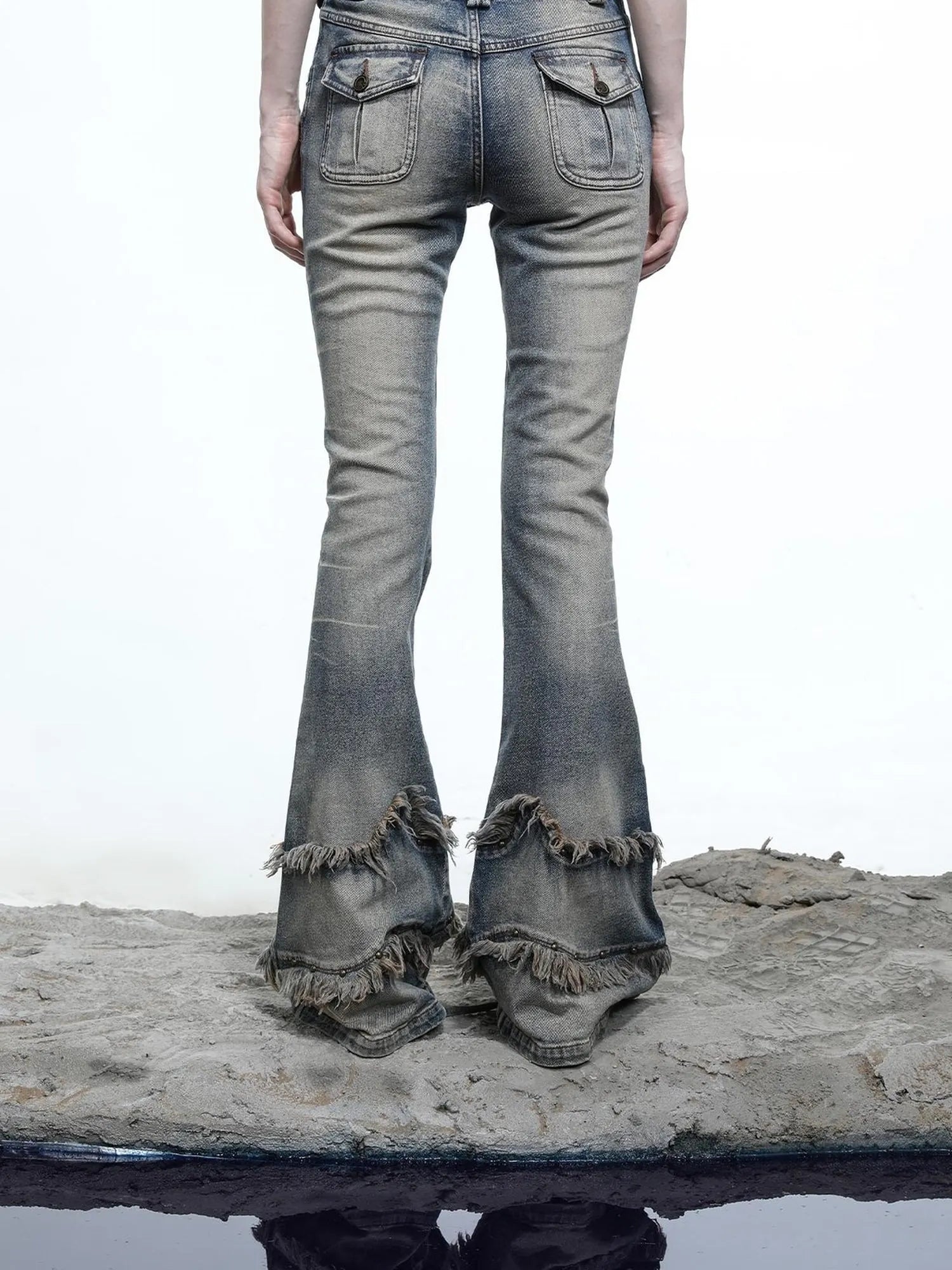 Ruffle Wash Flared Denim Trousers