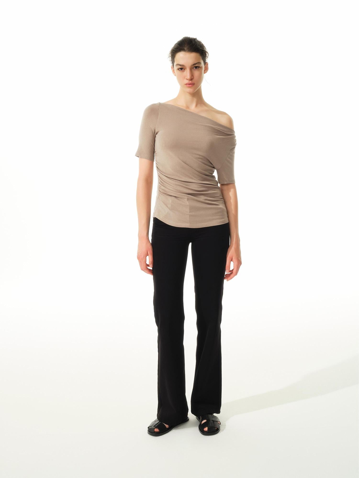 Northbutsouth Asymmetric Ruffle Hem Soft Fitted Top