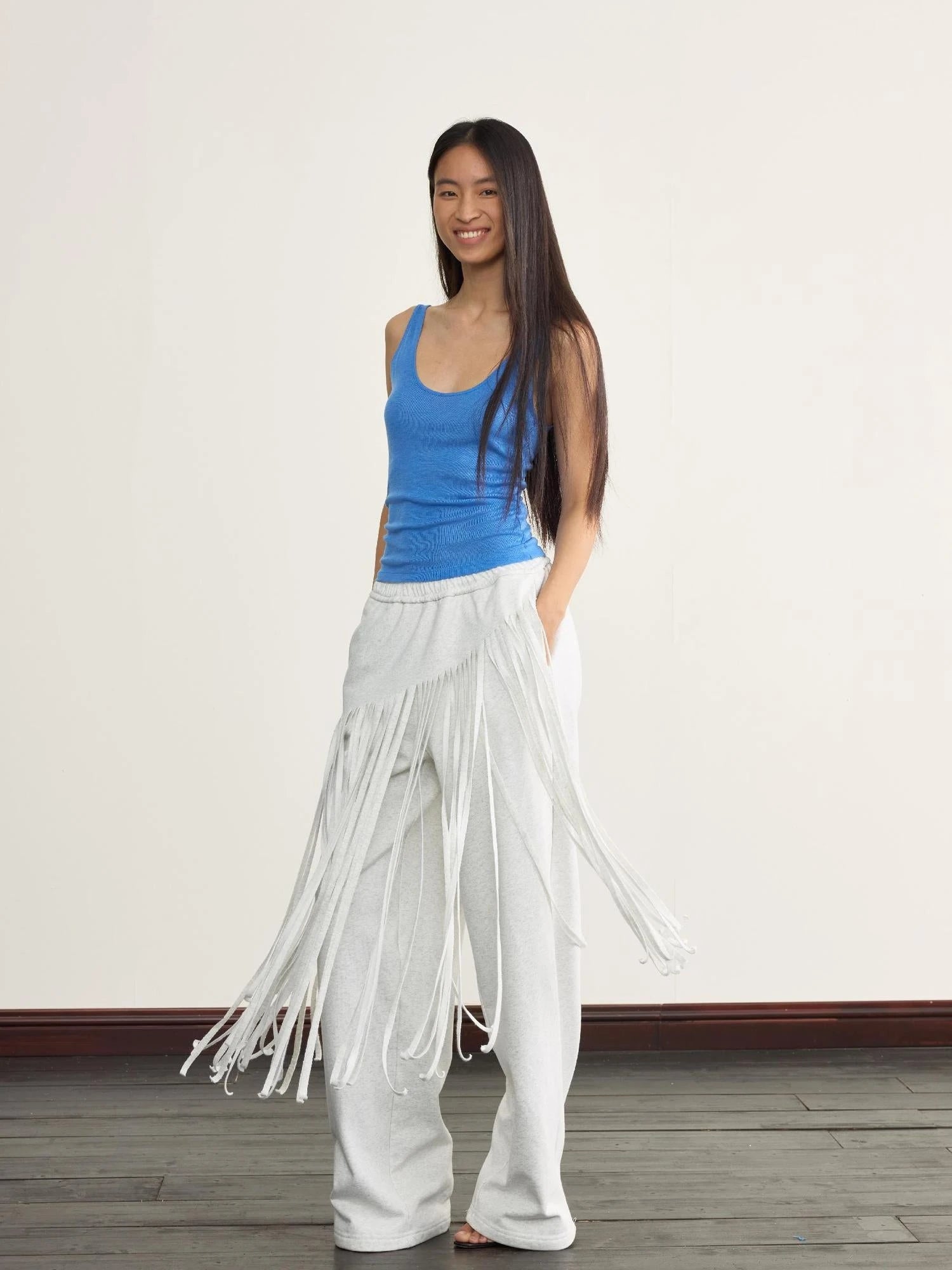 Fringed Knit Trousers With Cascading Layers