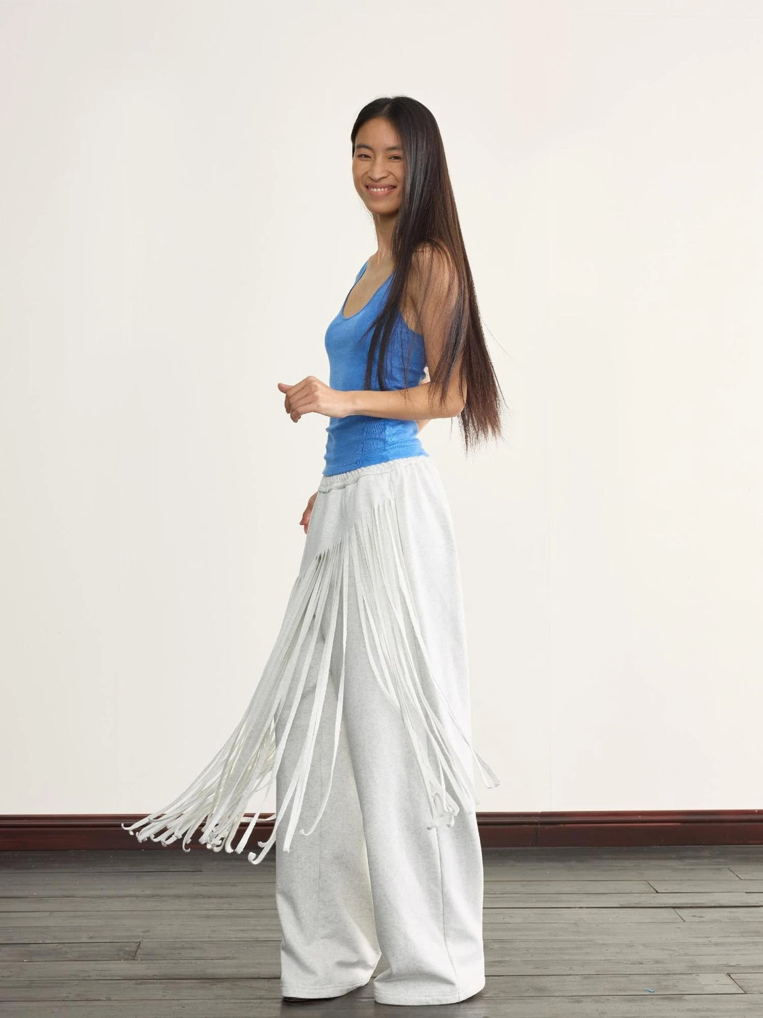 Fringed Knit Trousers With Cascading Layers