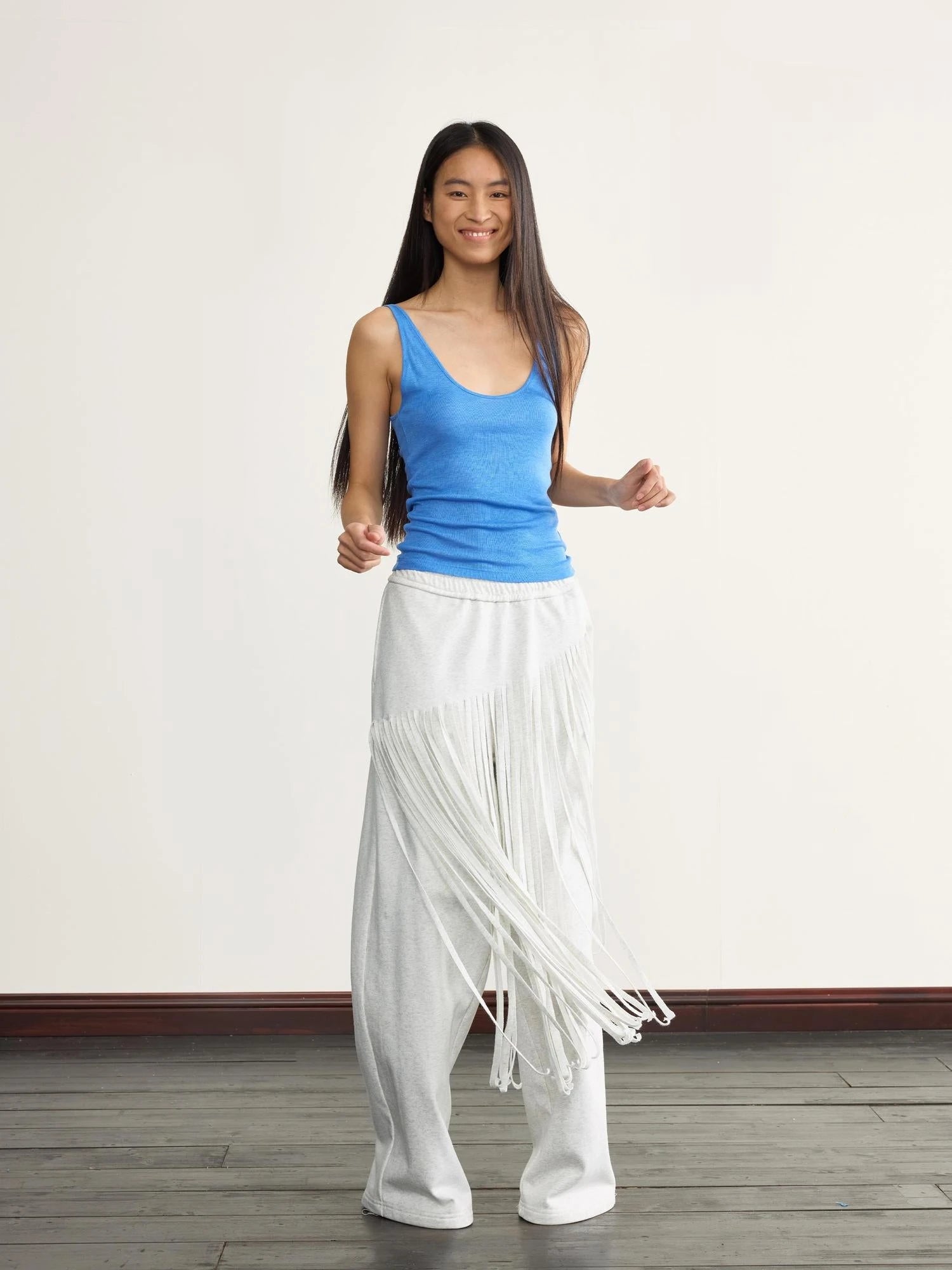 Fringed Knit Trousers With Cascading Layers