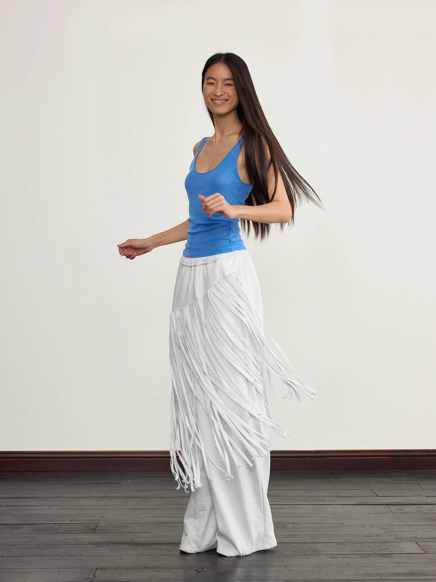 Fringed Knit Trousers With Cascading Layers