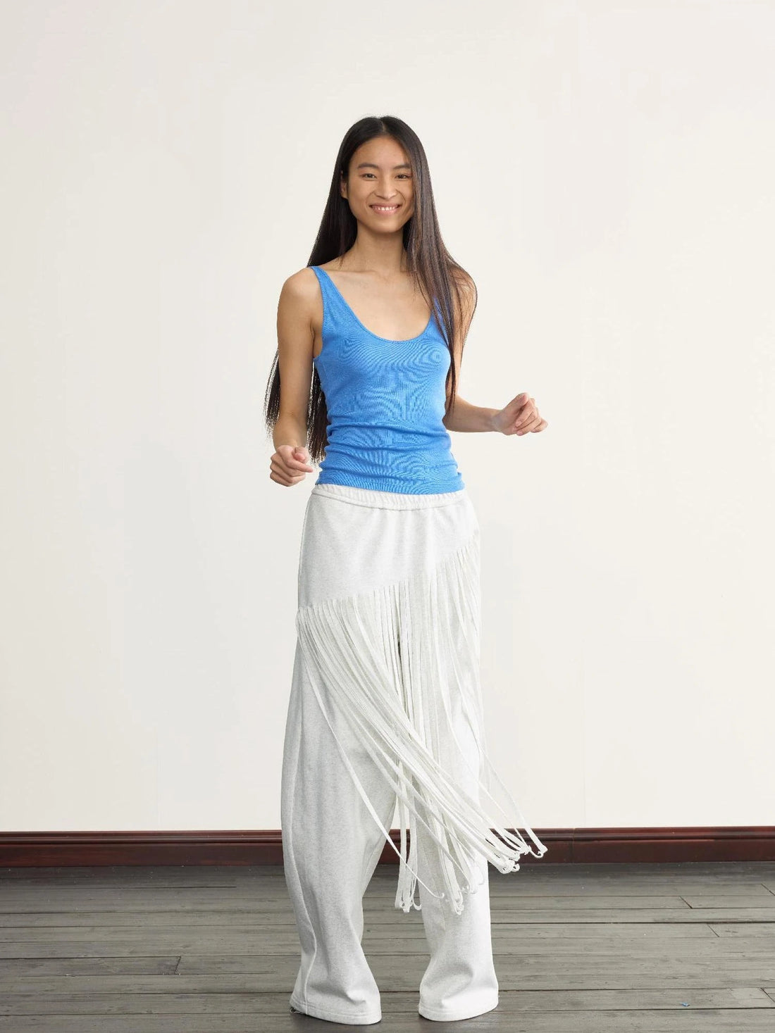 Fringed Knit Trousers With Cascading Layers