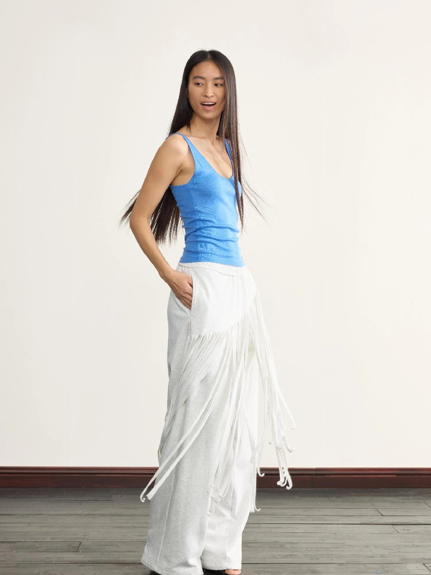 Fringed Knit Trousers With Cascading Layers