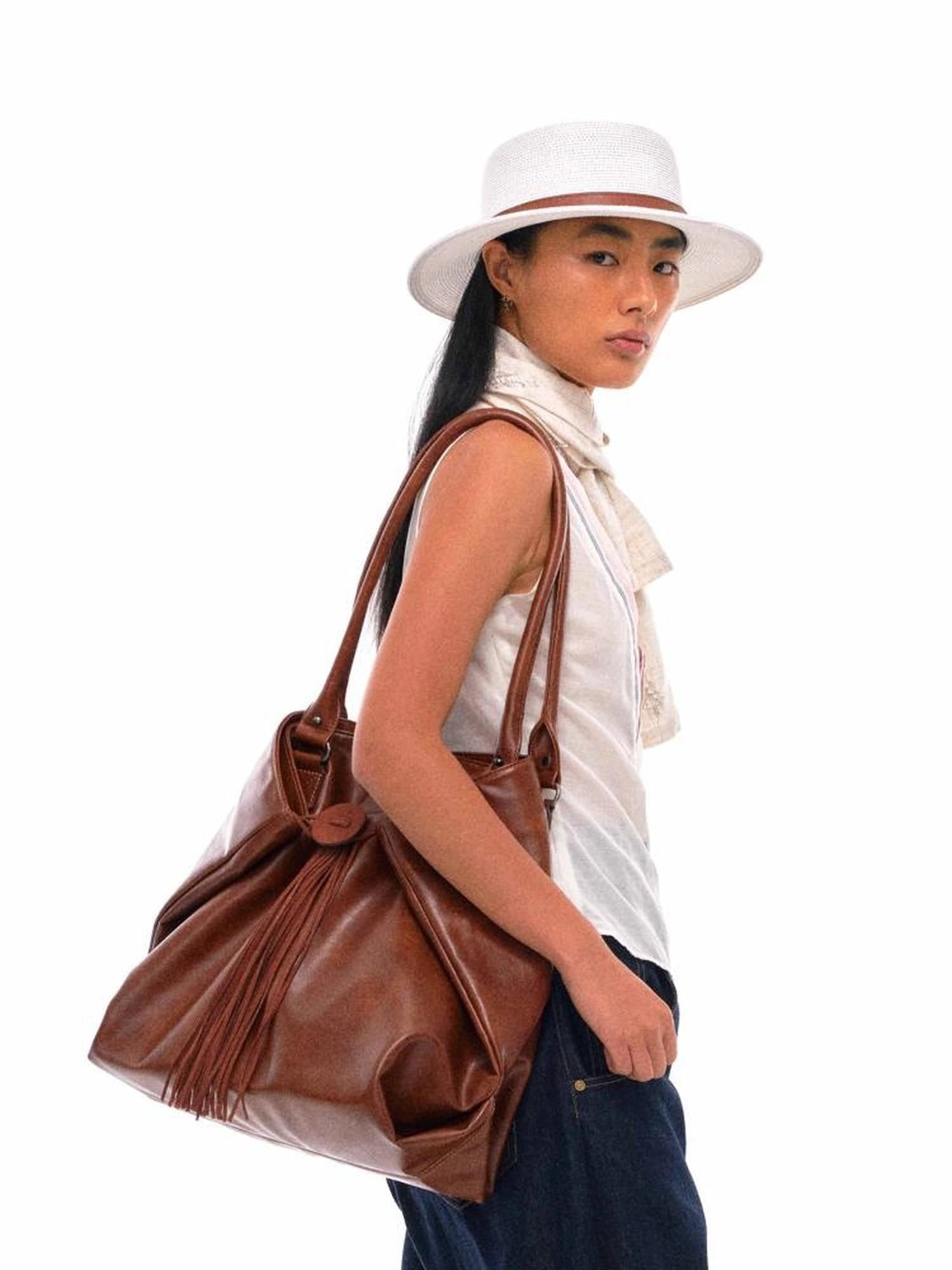 Vintage Brown Tote Bag With Adjustable Twist Lock And Fringe