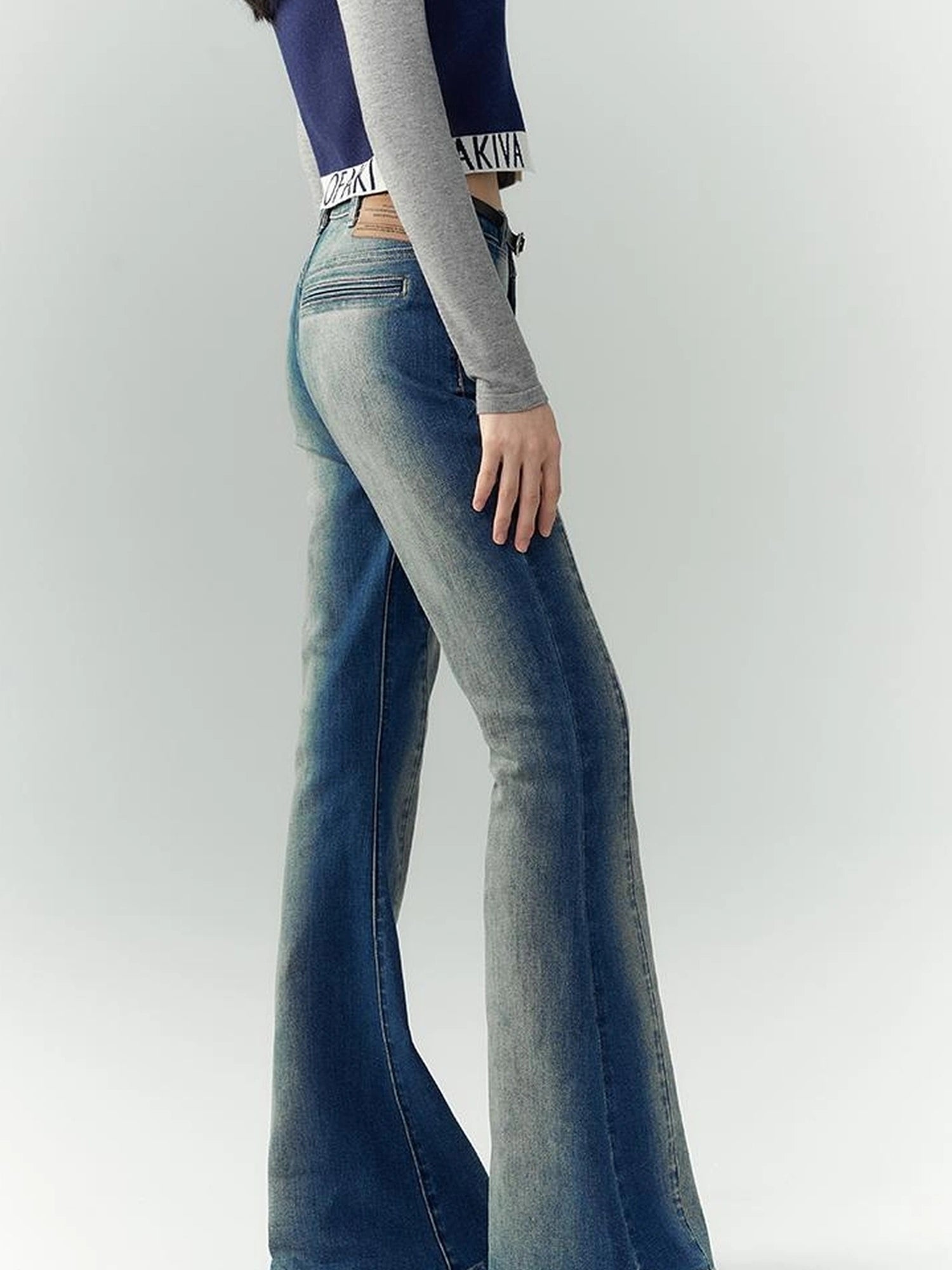 OfAkiva Akiva Asymmetric Waist Flared Jeans