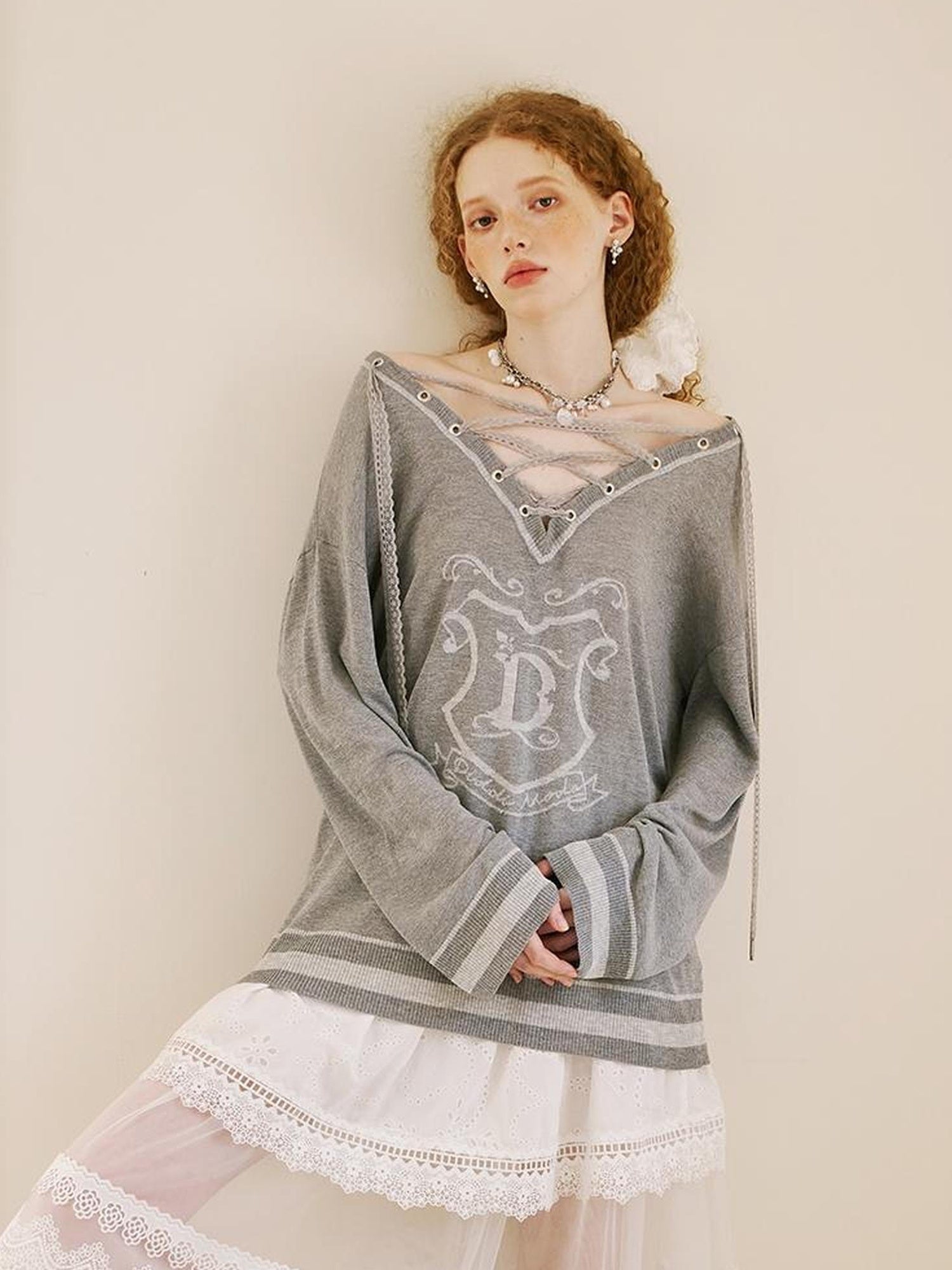 DIDDI MODA Vintage Lace Up V Neck Knit Top With Embroidered Crest