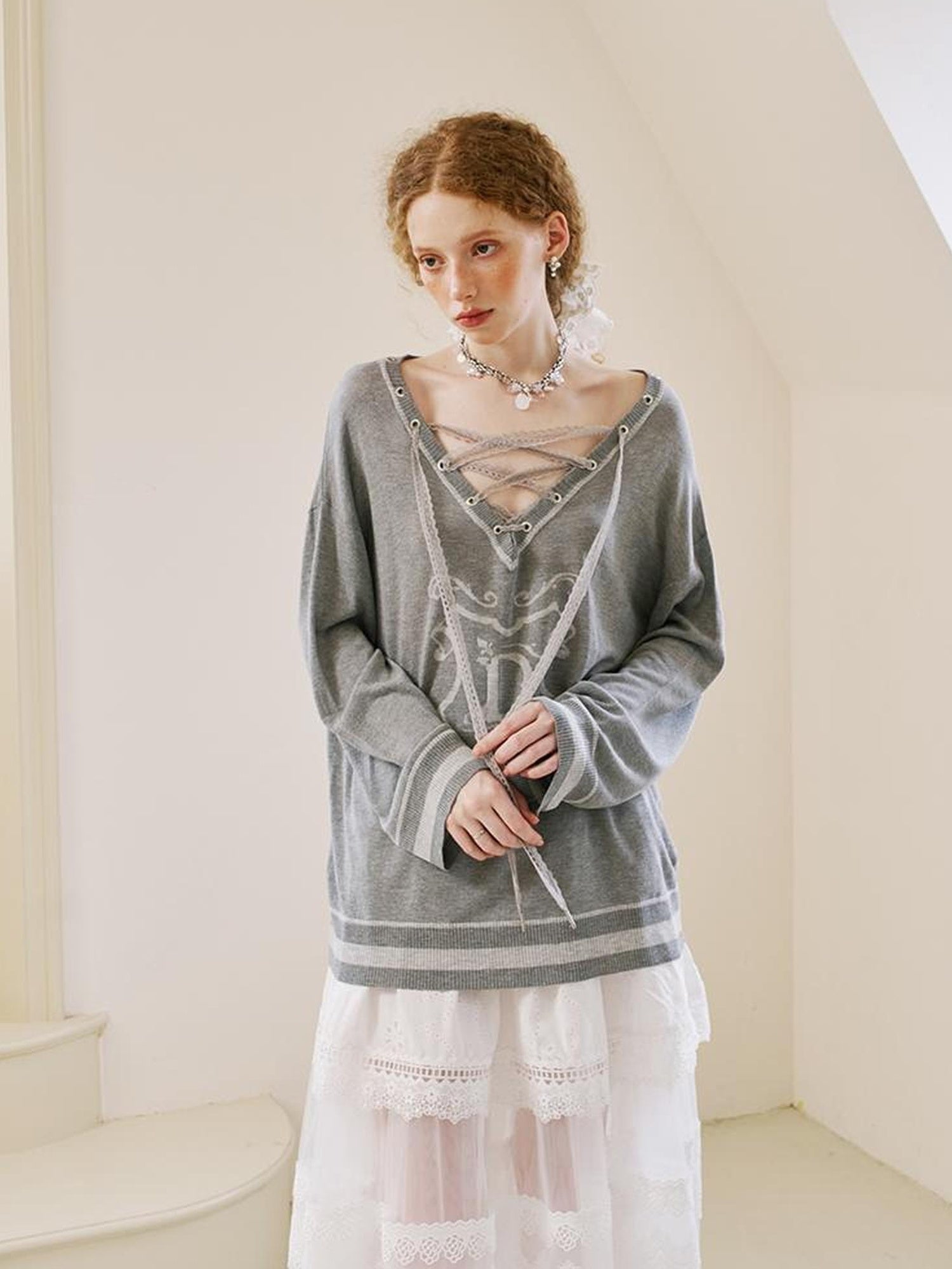 DIDDI MODA Vintage Lace Up V Neck Knit Top With Embroidered Crest
