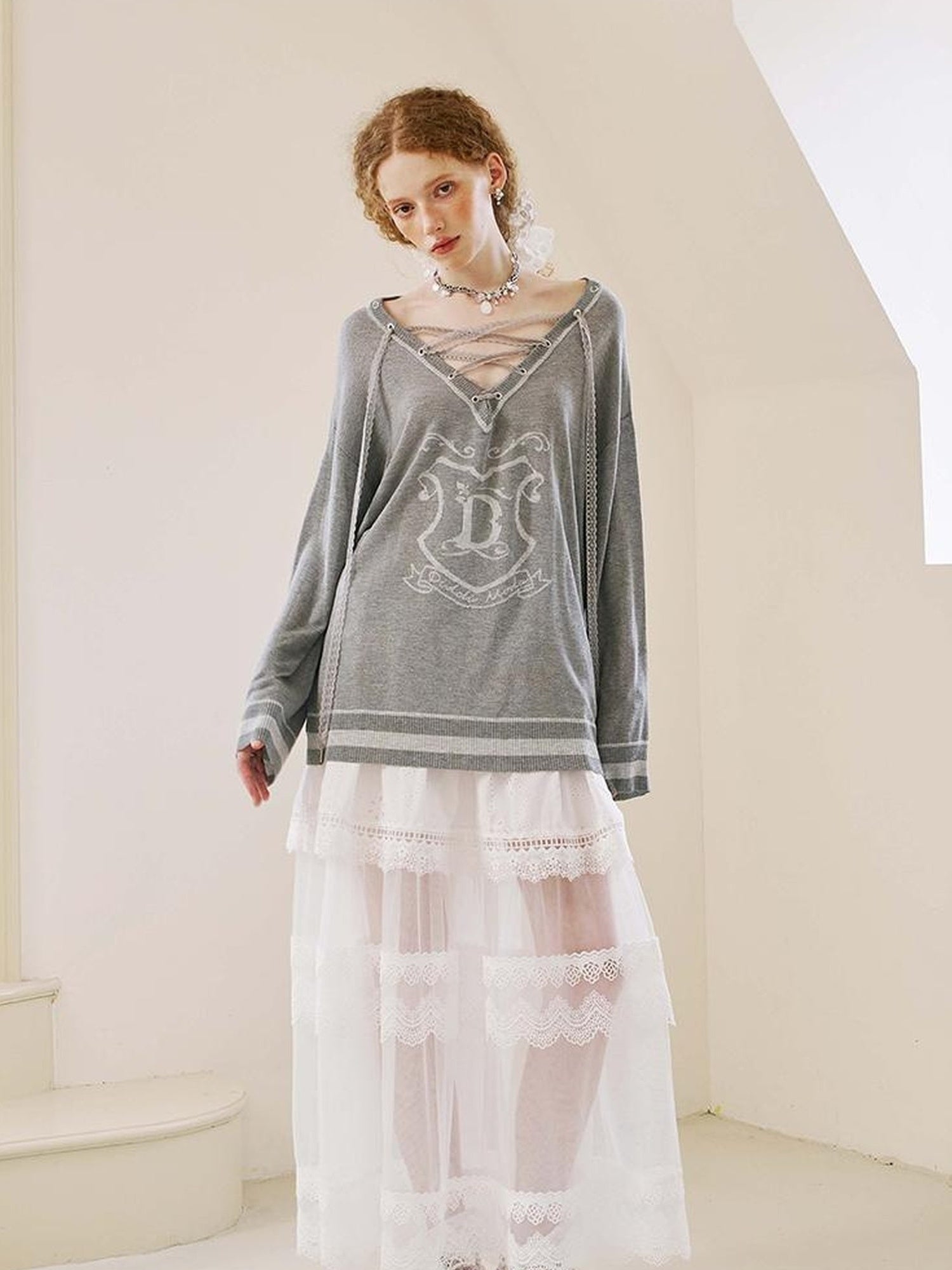 DIDDI MODA Vintage Lace Up V Neck Knit Top With Embroidered Crest