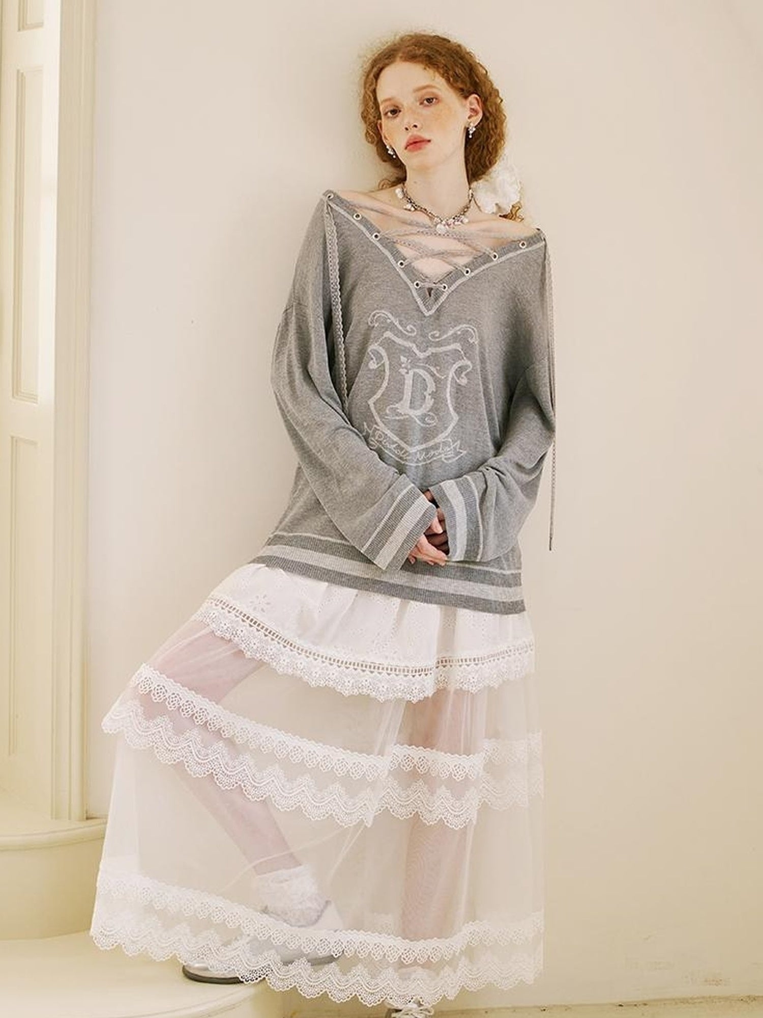DIDDI MODA Vintage Lace Up V Neck Knit Top With Embroidered Crest