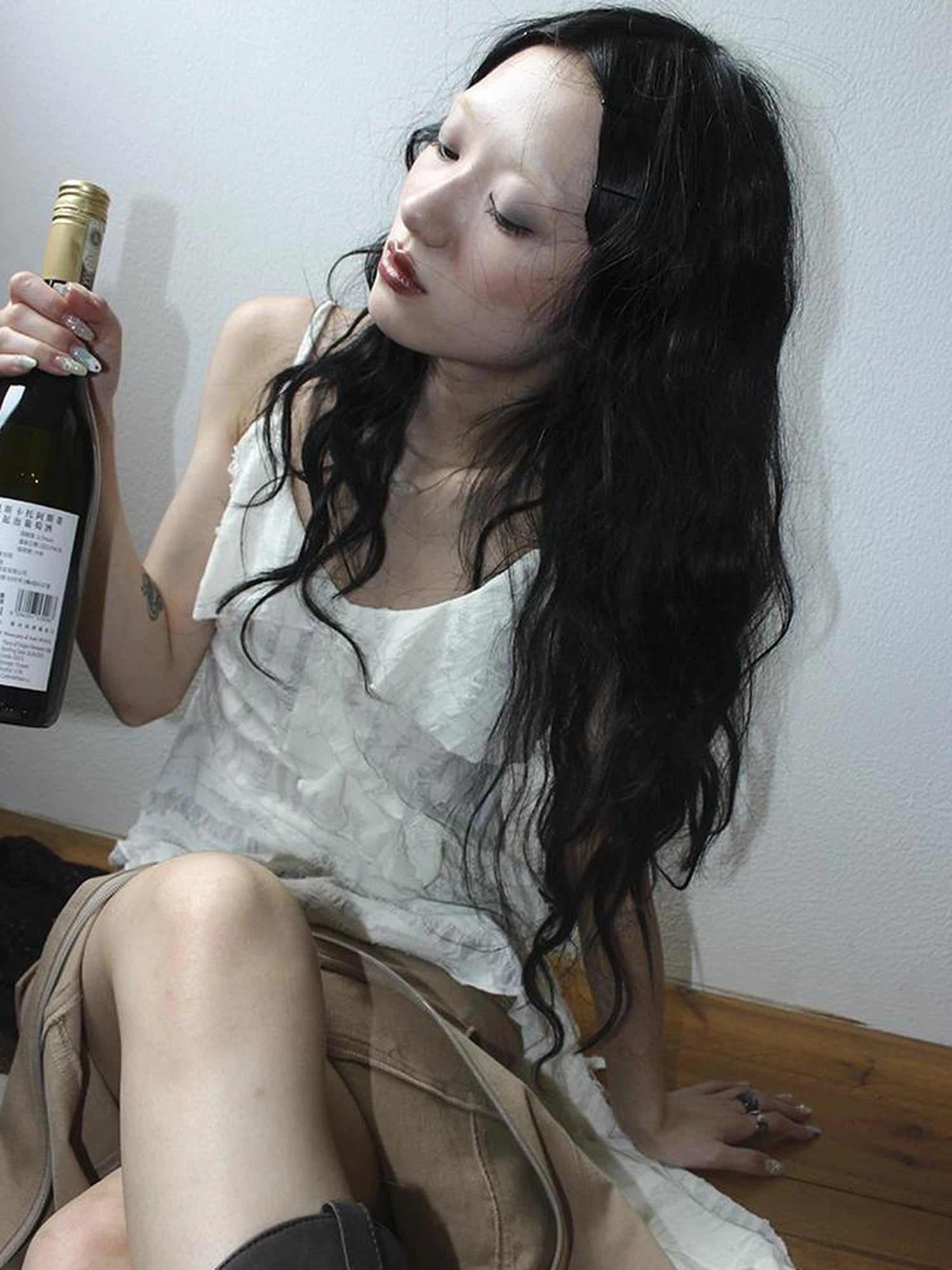 Distressed Asymmetrical Hem V-Neck Tank Top with Ruffle Straps