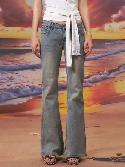 The NeverMore Durable Distressed Relaxed Low Rise Light Blue Denim Women Straight Leg Jeans