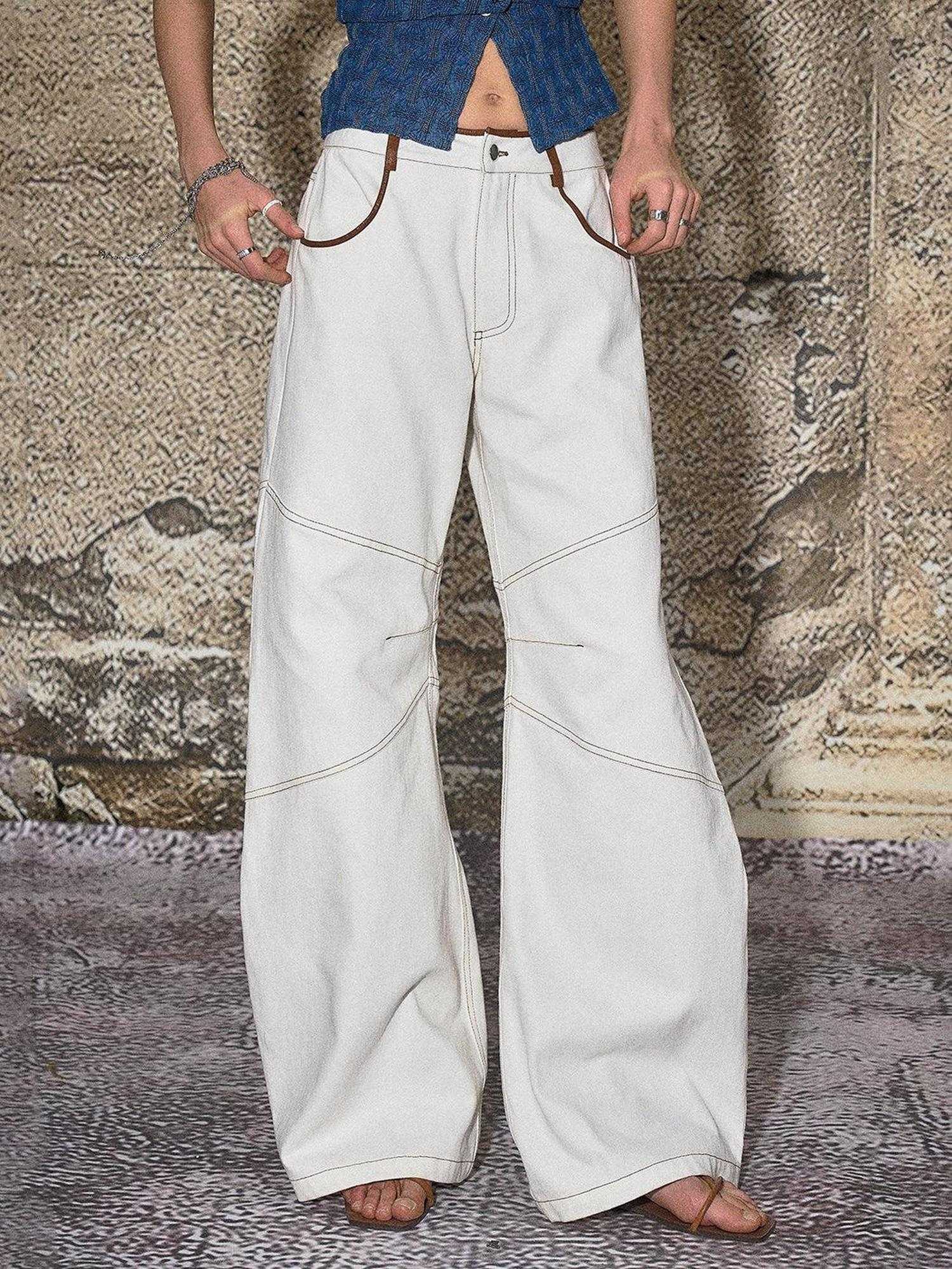 The NeverMore High Cotton Relaxed Distressed Low Rise White Denim Women Wide Leg Jeans