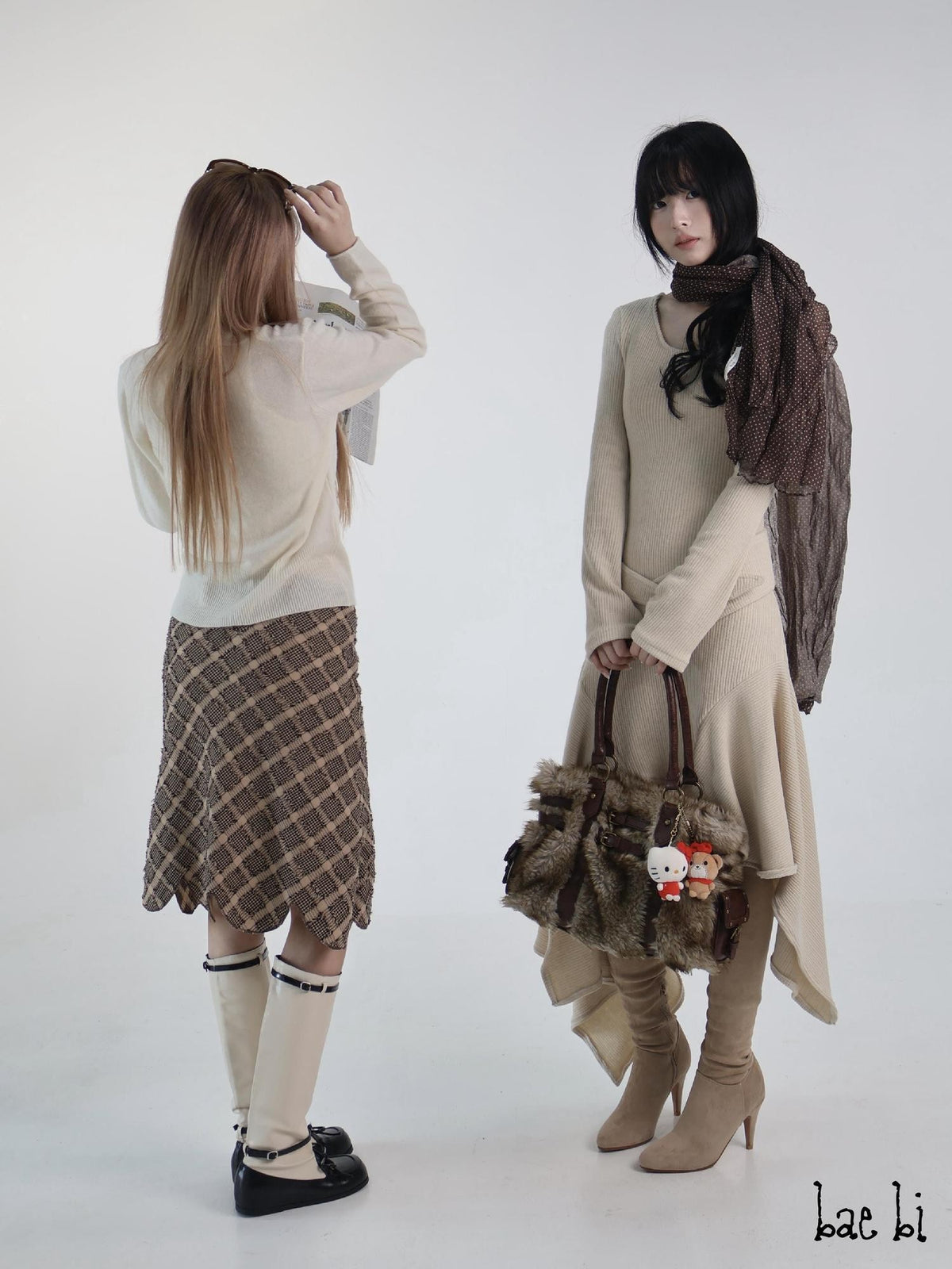 bae bi Ribbed Stripe Asymmetric Hem Long Sleeve Flared Cuff Women&