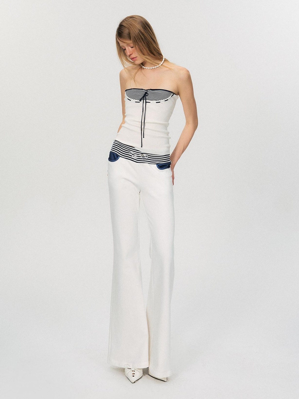 The NeverMore Comfortable Casual Cotton Blend Slight Flare Mid Rise Women White Straight Pants