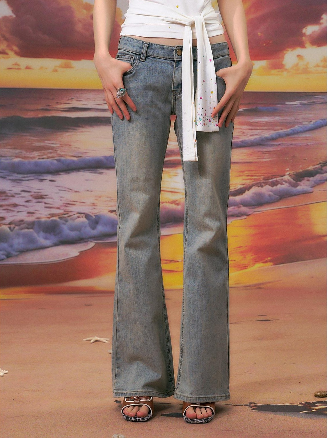 The NeverMore Durable Distressed Relaxed Low Rise Light Blue Denim Women Straight Leg Jeans