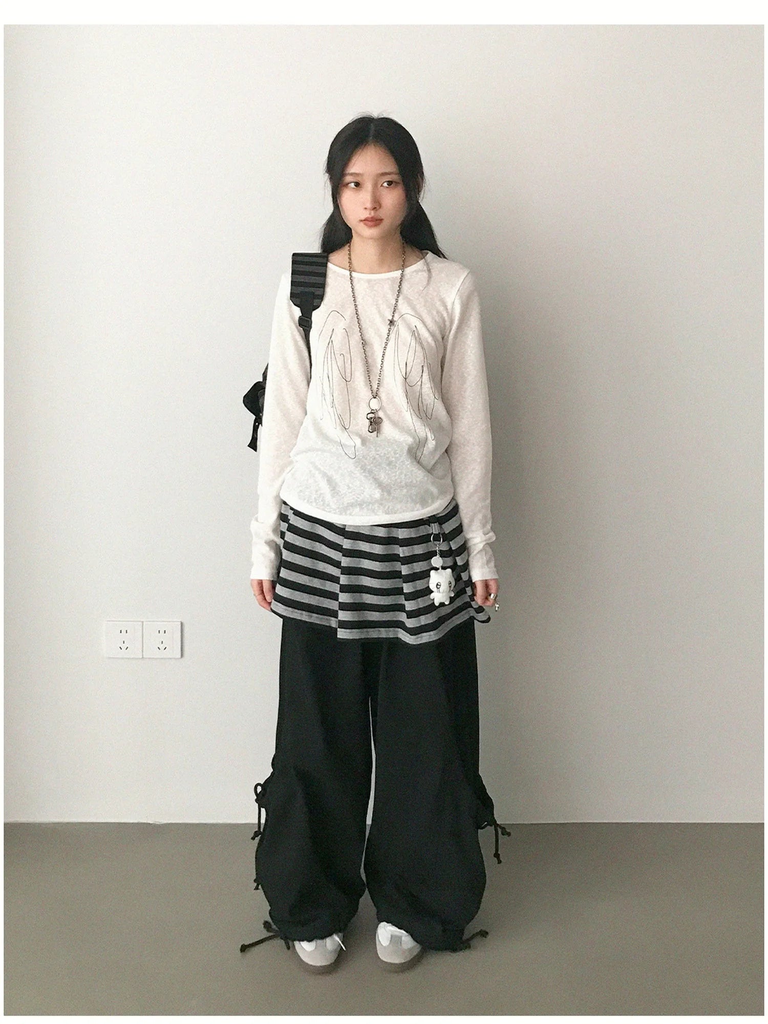 Striped Pleated Knit Miniskirt with Ribbed Waist