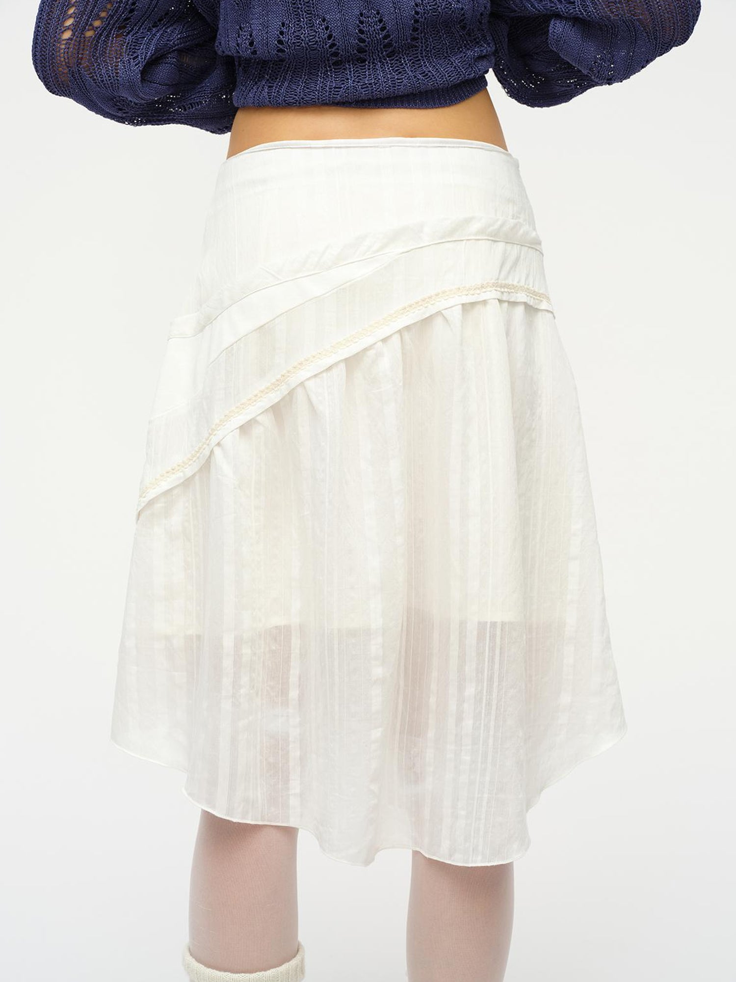 oinimi Asymmetrical Cloud Pleated Skirt In Soft Ivory