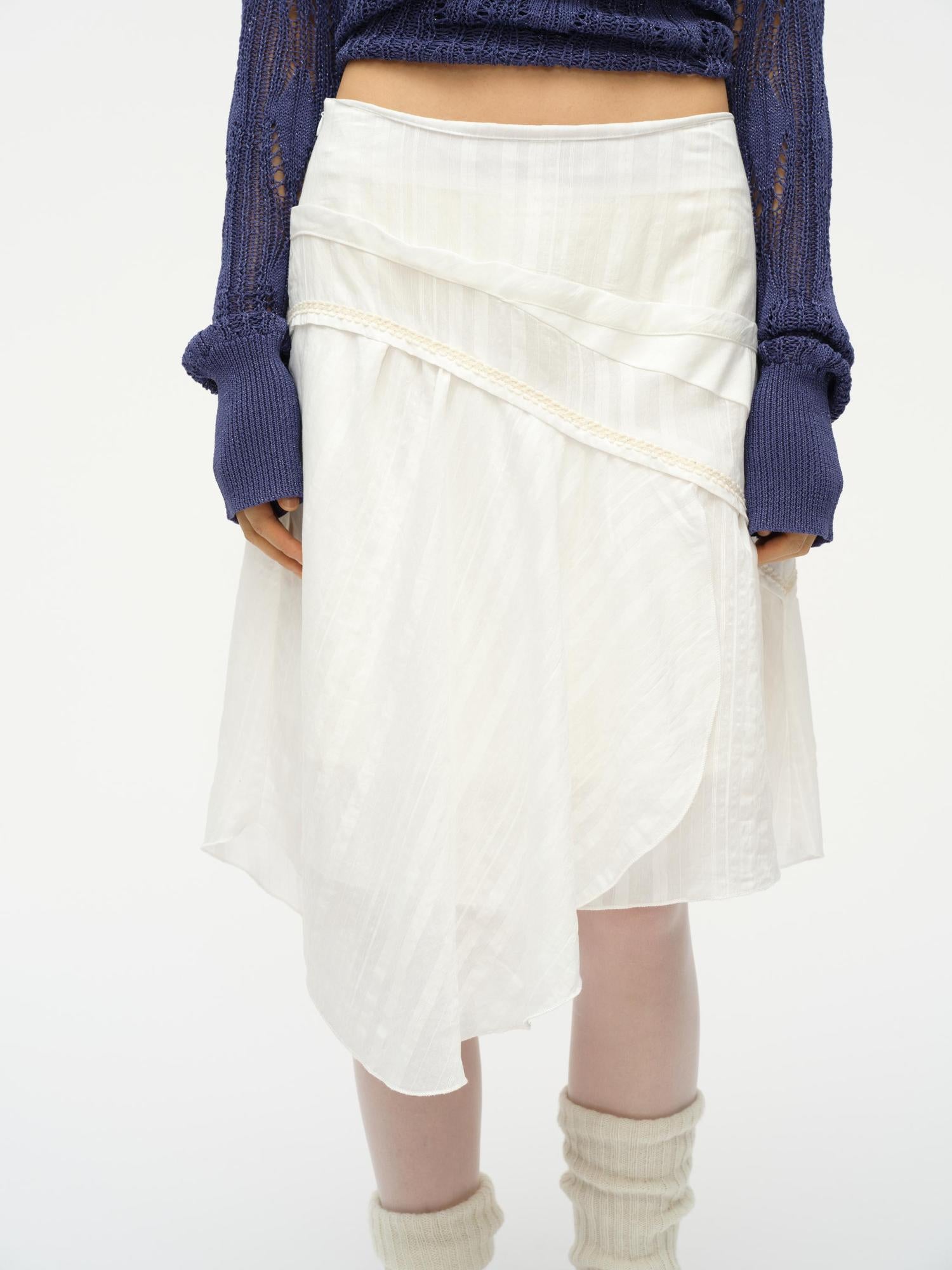 oinimi Asymmetrical Cloud Pleated Skirt In Soft Ivory