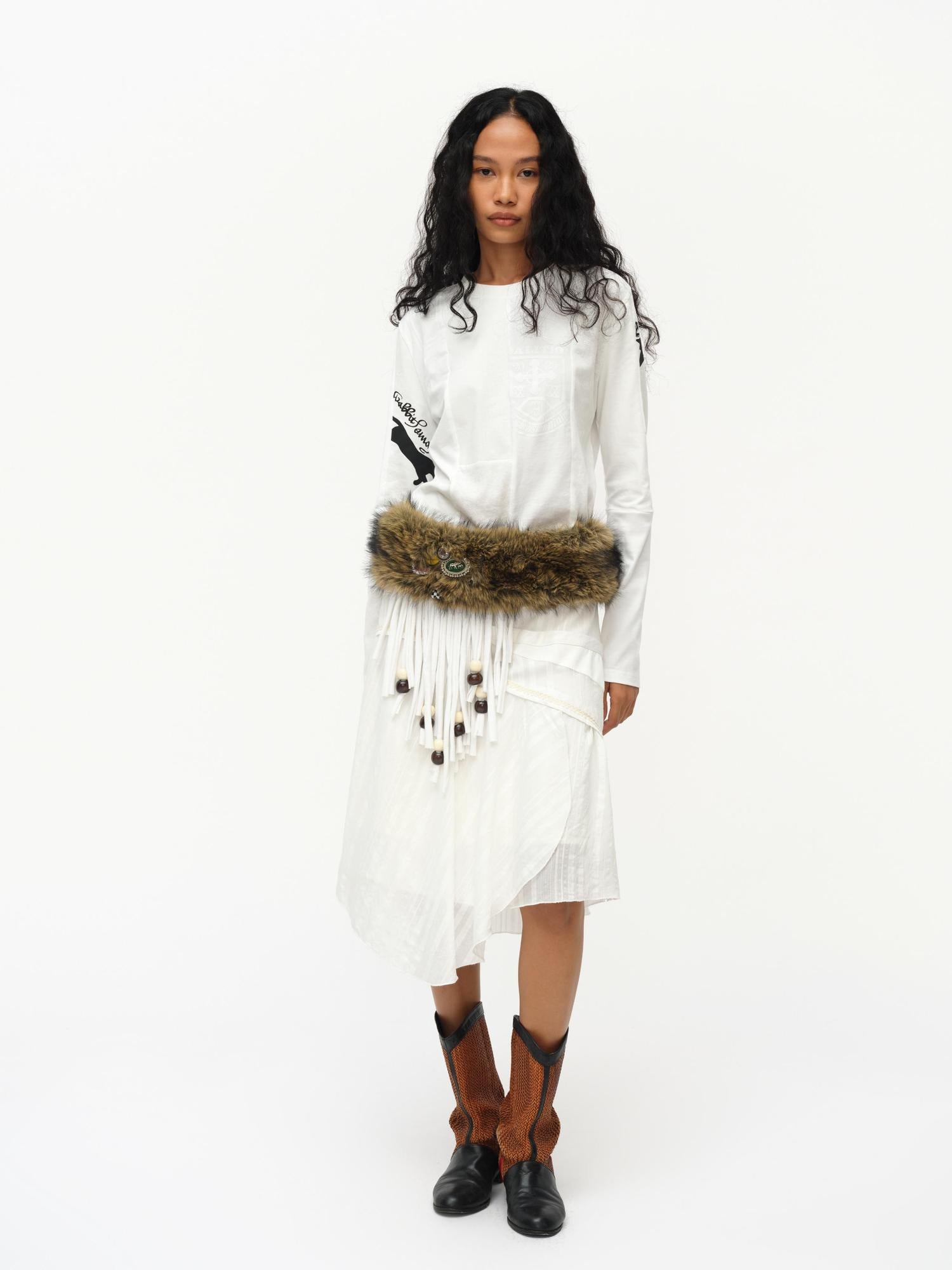 oinimi Asymmetrical Cloud Pleated Skirt In Soft Ivory