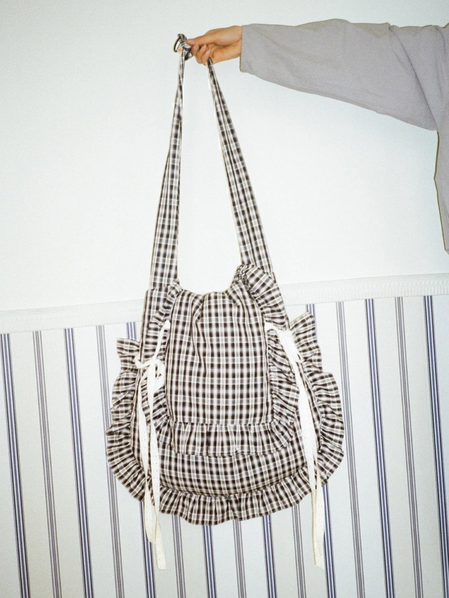 Lace Knotted Checkered Pillow Bag With Fluffy Cotton Ruffle Strap