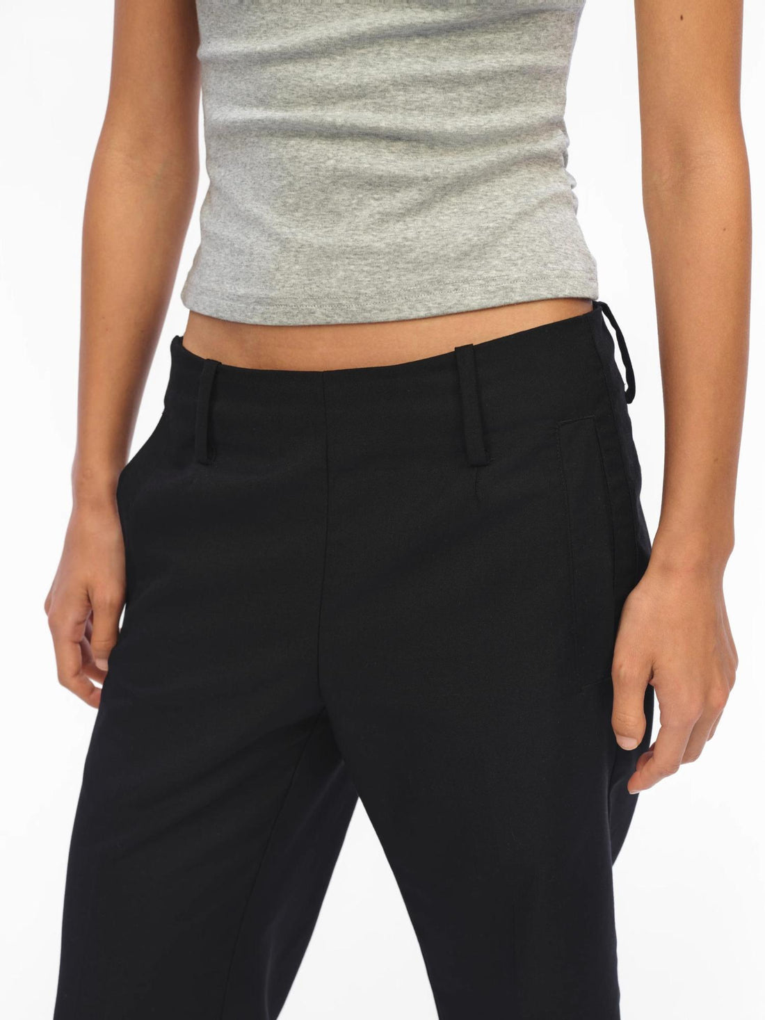 oinimi Low Rise 7 8 Flared Trousers In Slimming Black