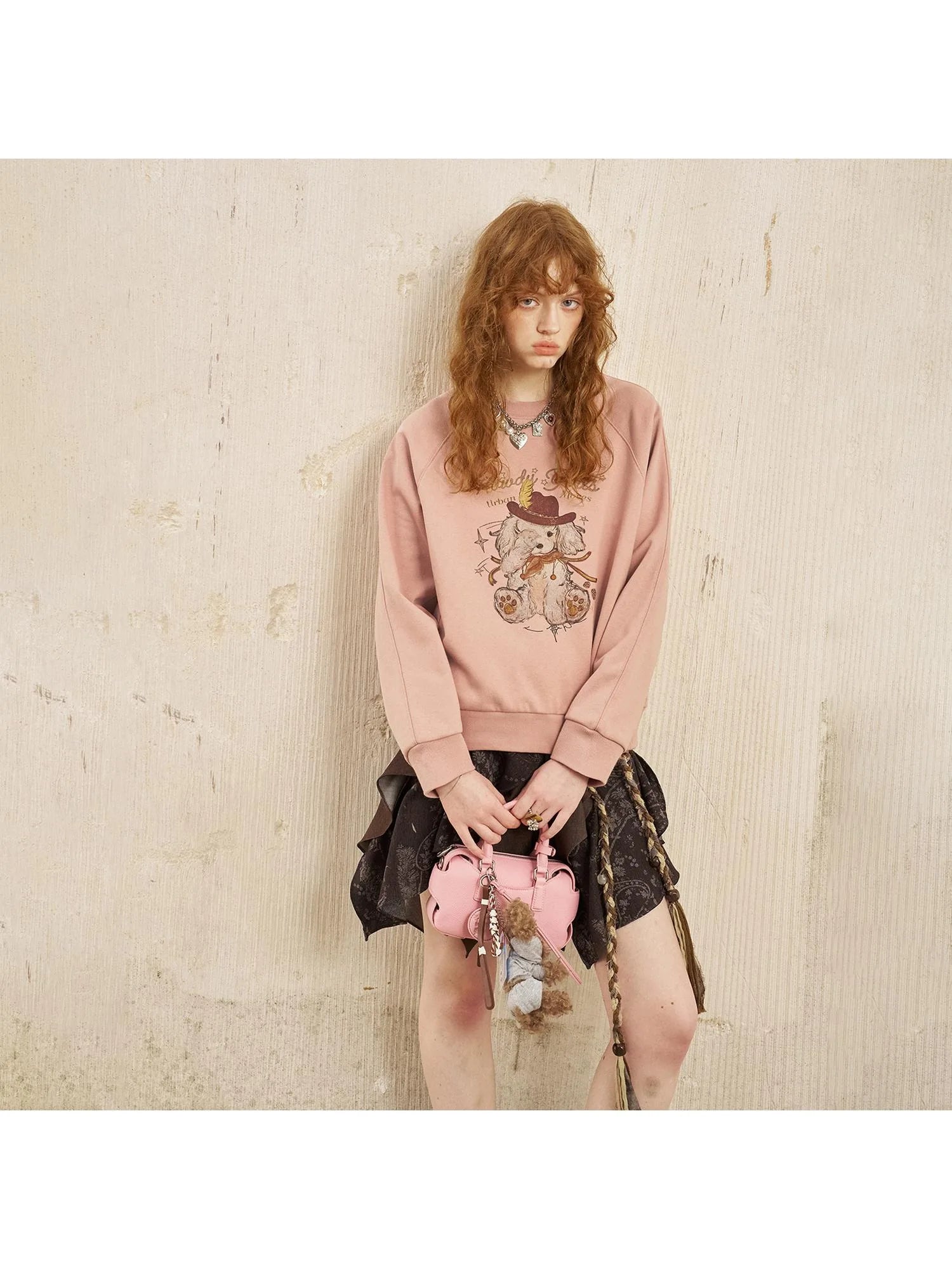 Blindfold Pup Canele Sweatshirt